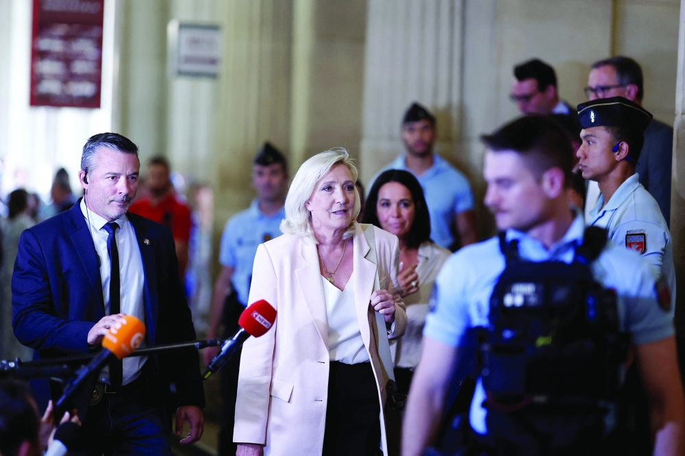 French far-right leader Marine Le Pen leaves the trial, at the Paris courthouse on the Ile de la Cite, in Paris. — Reuters