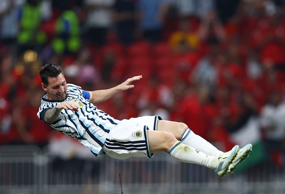  
Argentina's Lionel Messi celebrates after the match 
 