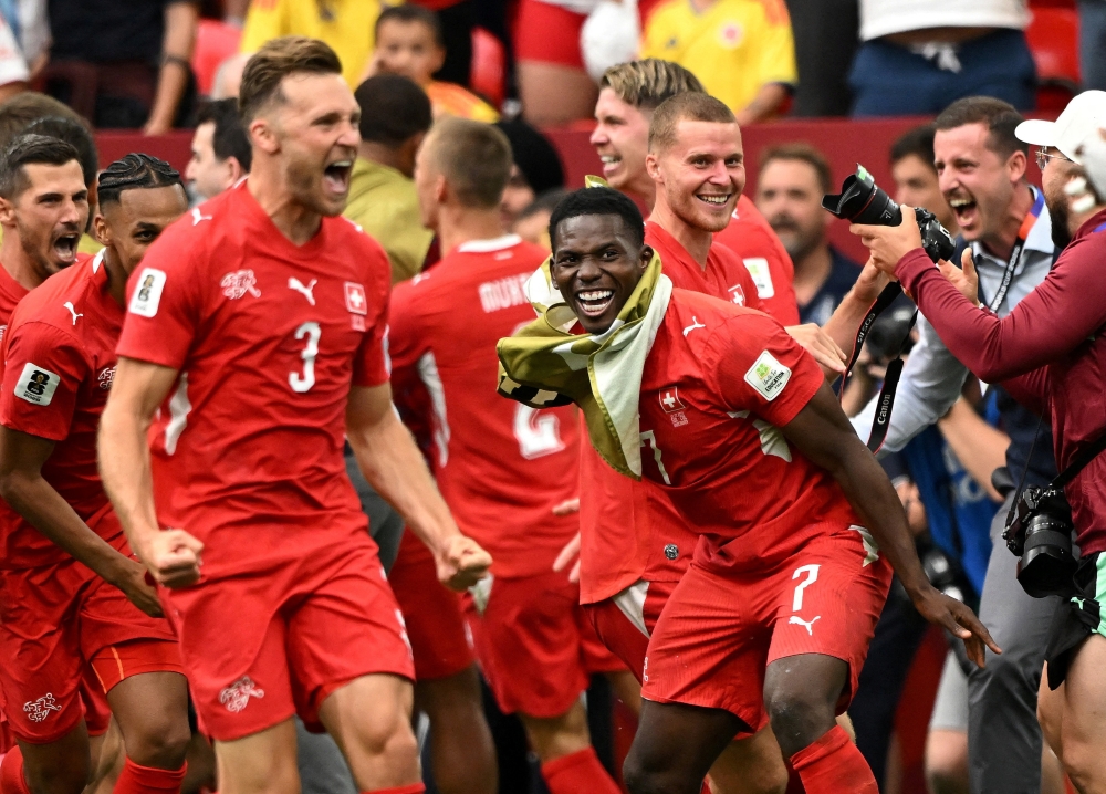  
Switzerland's Breel Embolo and teammates celebrate after the penalty shootout. — Reuters   