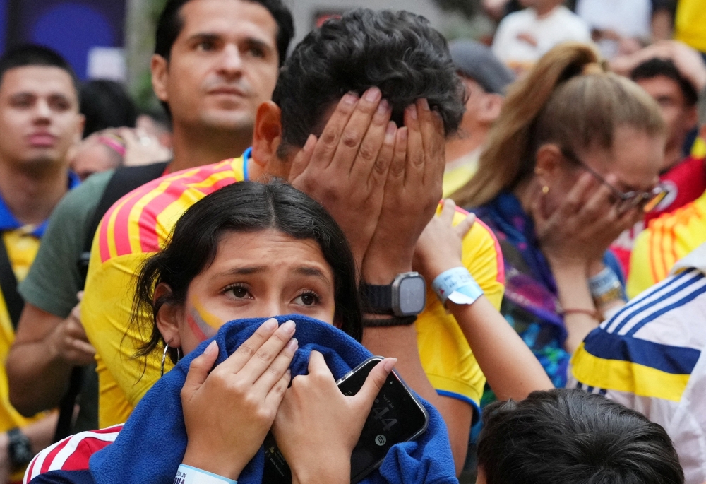 Colombia fans react at the Rockefeller Center fan village during the penalty shootout following the country's FIFA World Cup 2026 - Round 16 match against Switzerland 