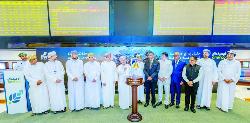Dignitaries and officials at the formal listing of OMIFCO on the MSX on Wednesday.