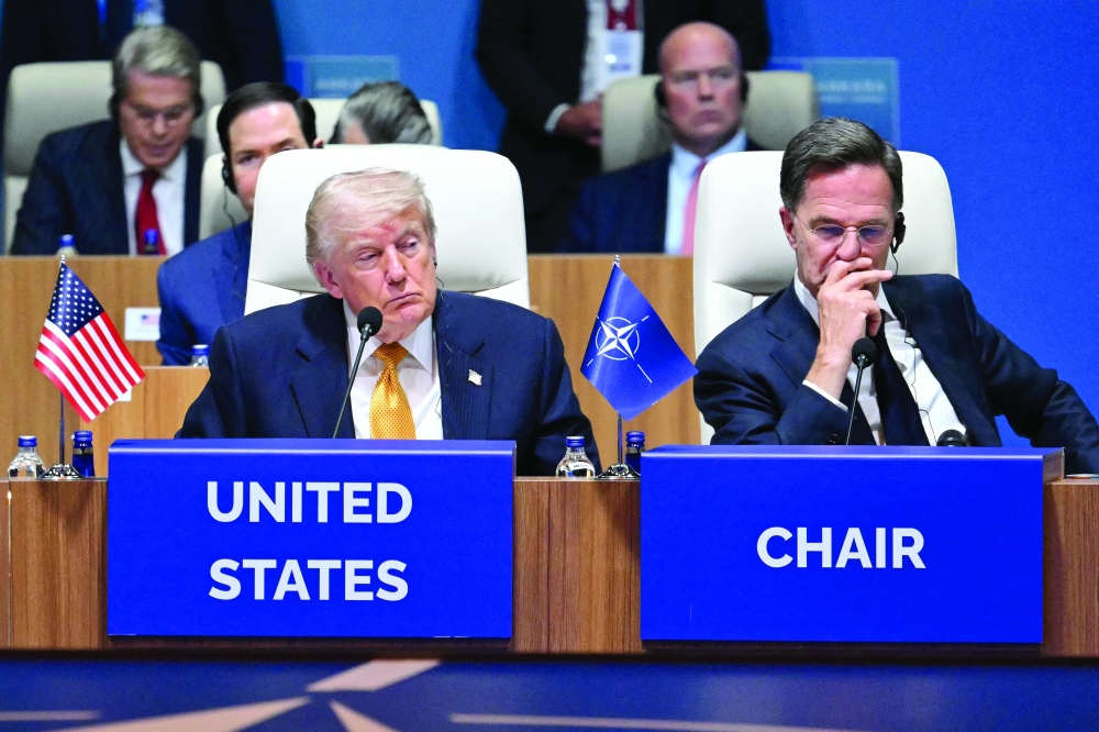 US President Donald Trump and Nato Secretary General Mark Rutte (R) attend the Nato Summit in Ankara. — AFP