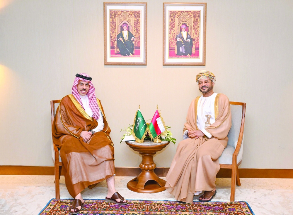 Sayyid Badr bin Hamad al Busaidy with Prince Faisal bin Farhan al Saud in Muscat on Wednesday. — ONA