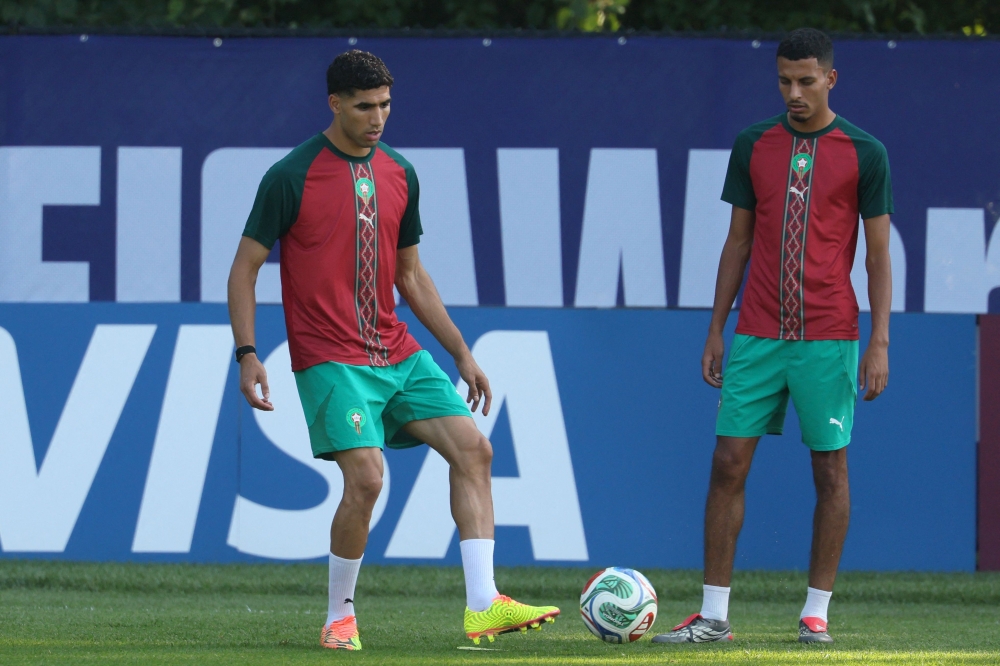 Morocco's #02 Hakimi (L) and  #08 Ounahi during training. — AFP