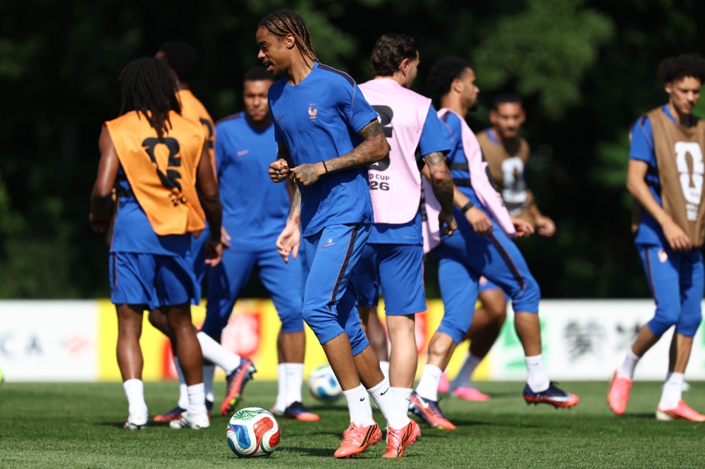 France's #12 Barcola during training. — AFP 