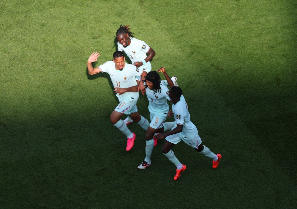  
France's Ousmane Dembele celebrates scoring their second goal with Kylian Mbappe, Manu Kone and Jules Kounde  