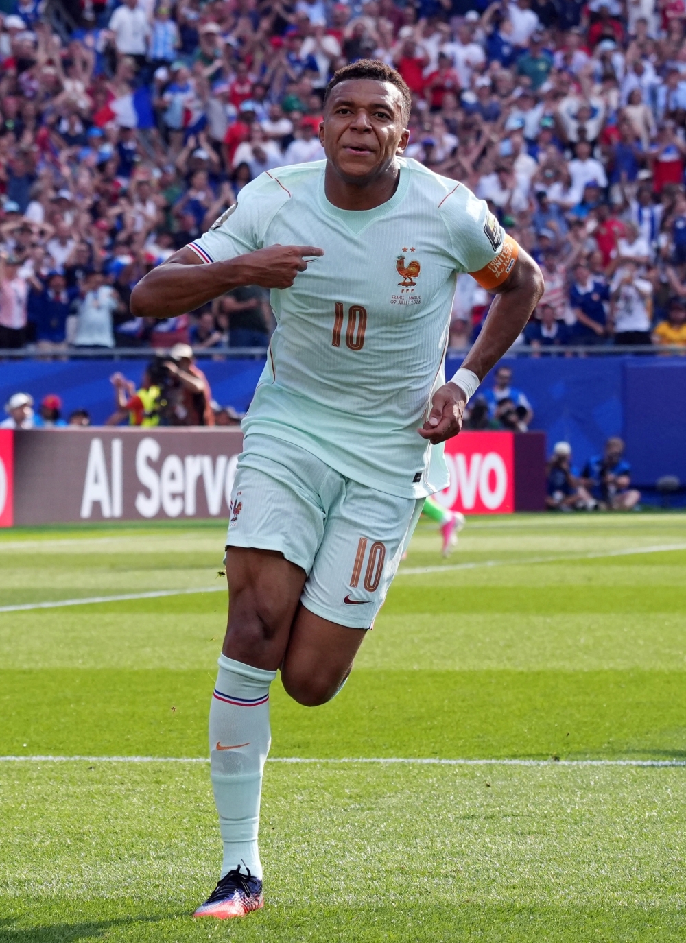  
France's Kylian Mbappe celebrates scoring their first goal  