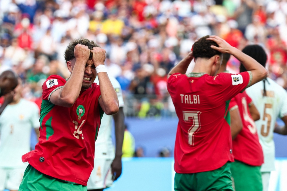 Morocco's #24  El Aynaoui reacts to a missed chance. — AFP 