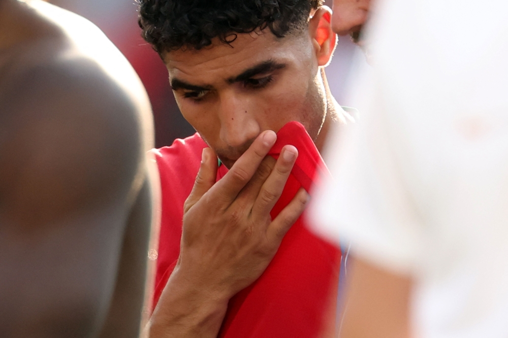 Morocco's  #02 Achraf Hakimi reacts after losing. — AFP 