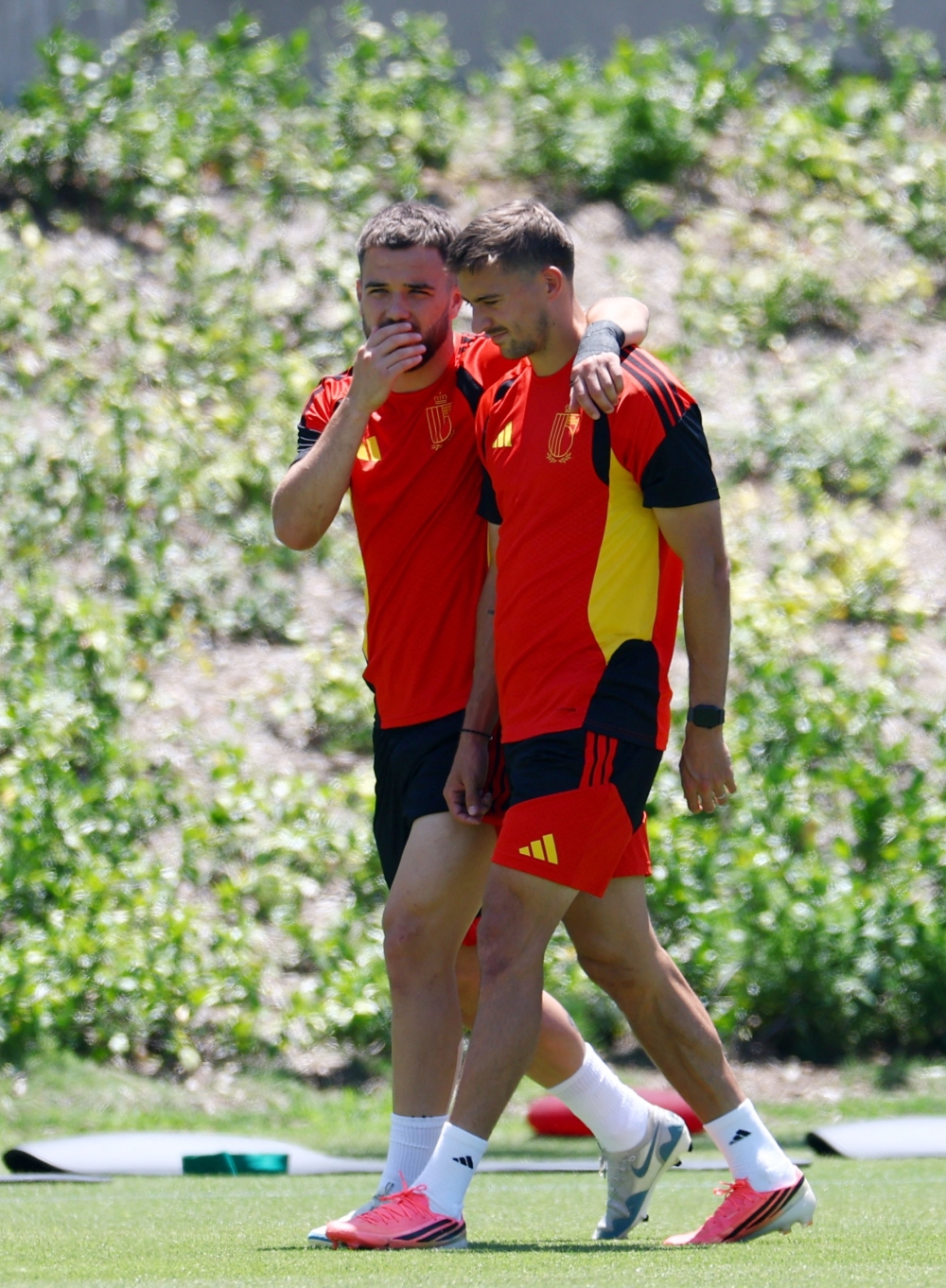  
Belgium's Raskin and Castagne during training. — Reuters  