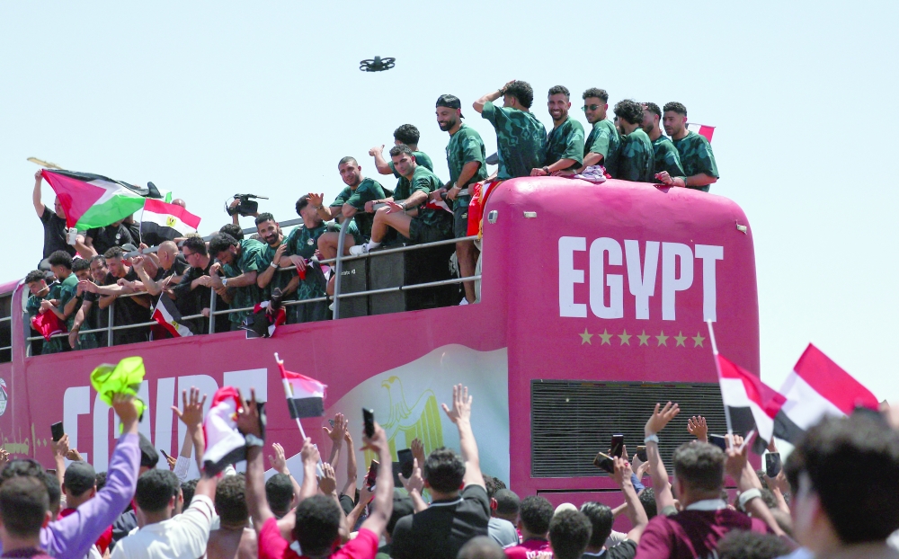 Egypt's national team is welcomed by fans at El Alamein International Airport upon its return from the 2026 Fifa World Cup, ahead of an official reception by President Abdel Fattah al Sisi. — Reuters