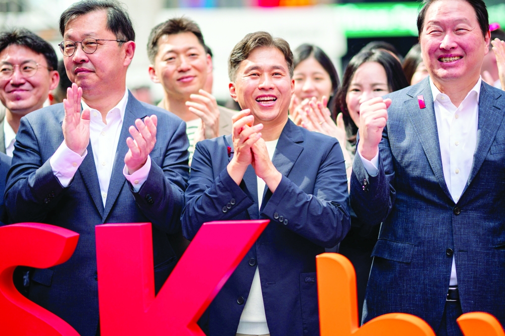 Semiconductor and memory chip company SK Hynix CEO Kwak Noh-Jung attends the company's opening bell ceremony at the Nasdaq market on the day of their IPO in New York City. — Reuters