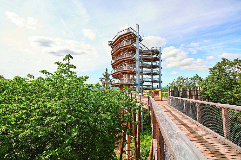 A tall tower of the treetop walkway with a beautiful view of the Saarschleife in Mettlach