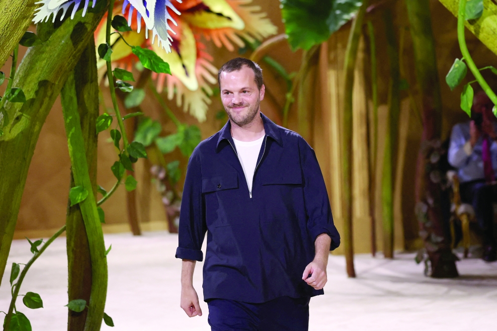 Designer Matthieu Blazy appears at the end of his Haute Couture Fall/Winter 2026-2027 collection show for the fashion house Chanel. -Reuters
