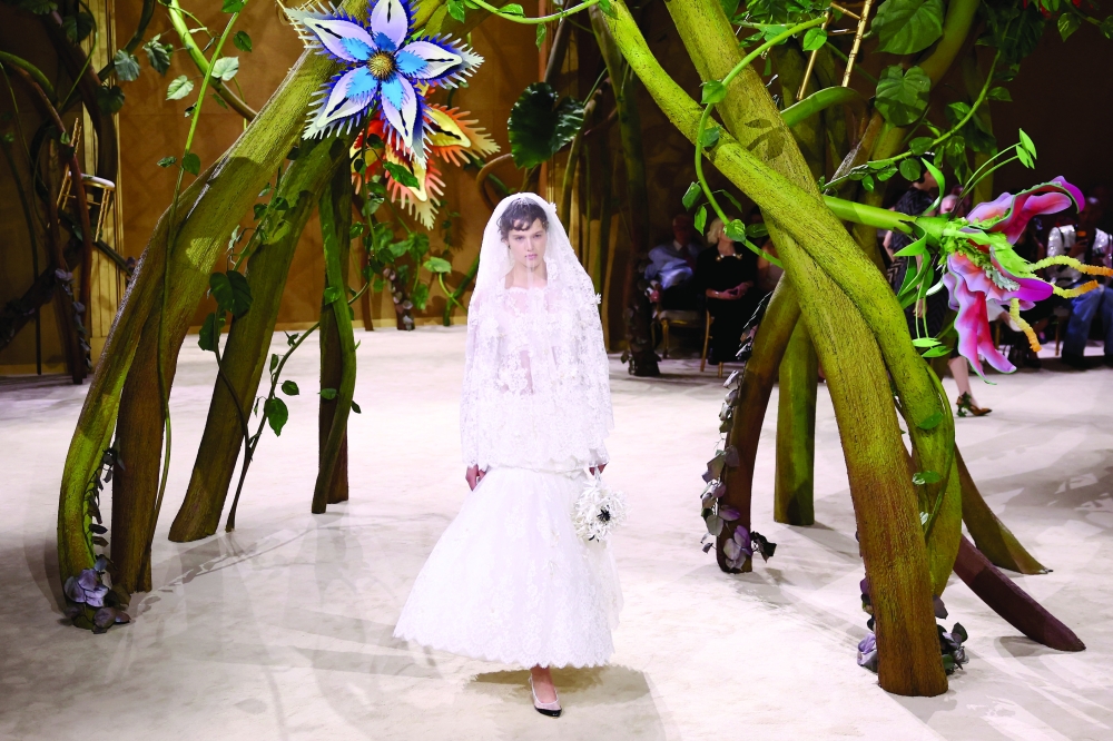 A model presents a creation by designer Matthieu Blazy as part of his Haute Couture Fall/Winter 2026-2027 collection show for the fashion house Chanel. -Reuters 