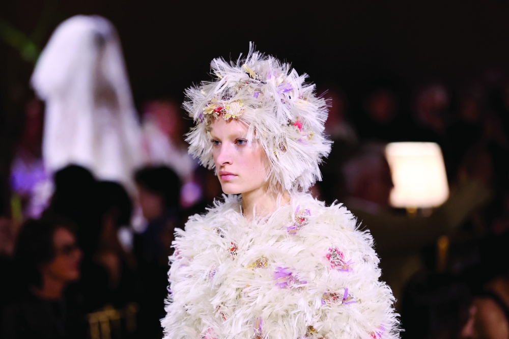 A model presents a creation by designer Matthieu Blazy as part of his Haute Couture Fall/Winter 2026-2027 collection show for the fashion house Chanel. -Reuters 