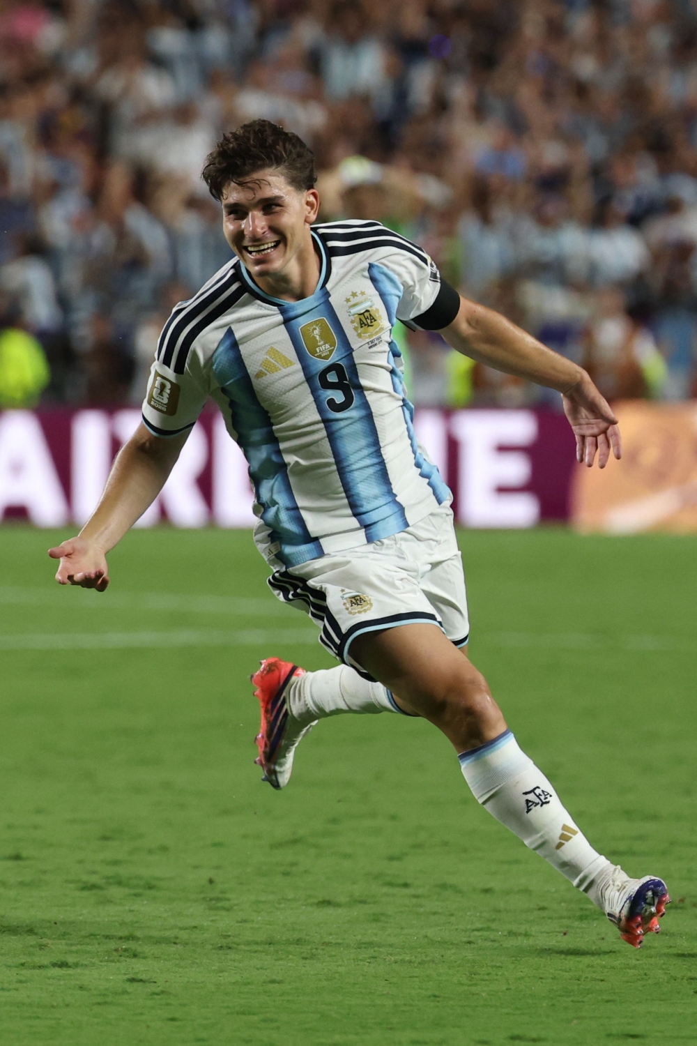 Argentina's forward #09 Julian Alvarez celebrates scoring his team's second goal  