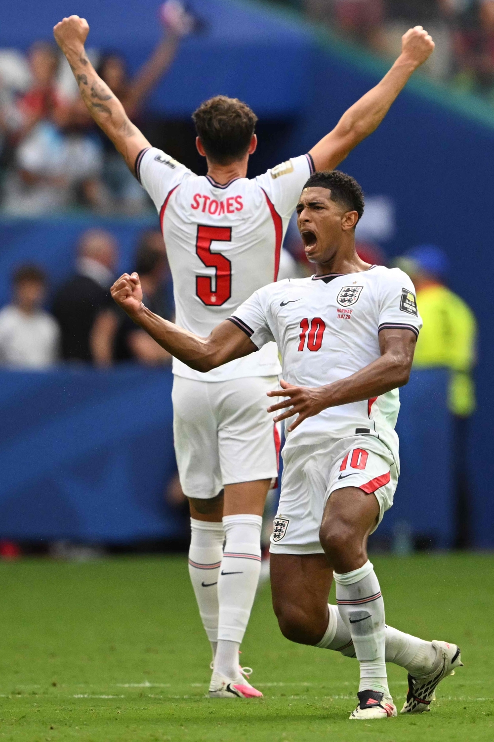 England's  #10 Bellingham celebrates first goal. — AFP