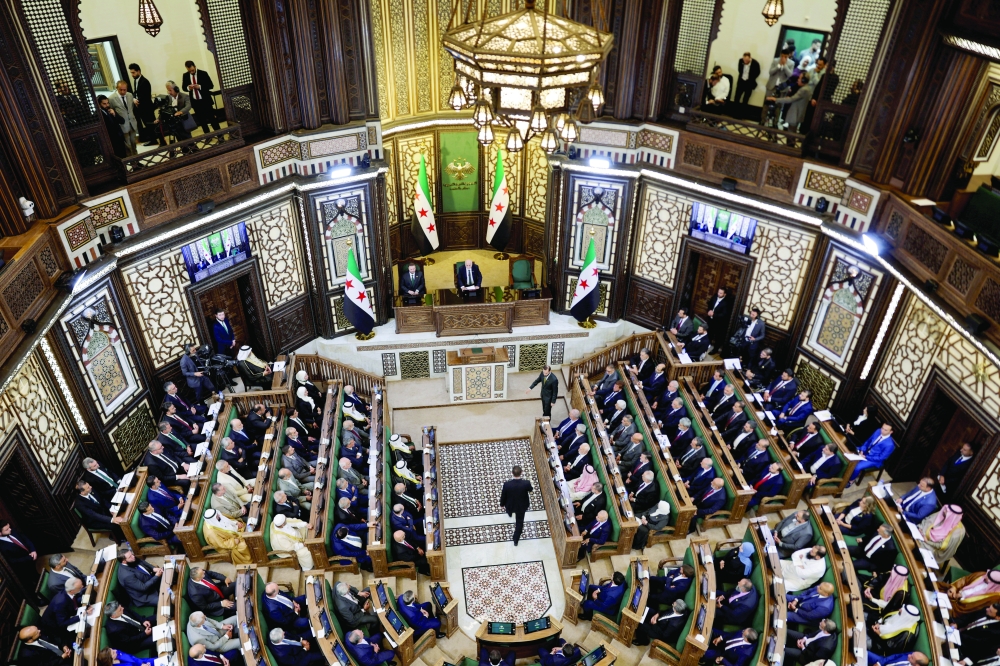 Members of Syria's newly formed People's Assembly attend the body's inaugural session in Damascus. — Reuters 