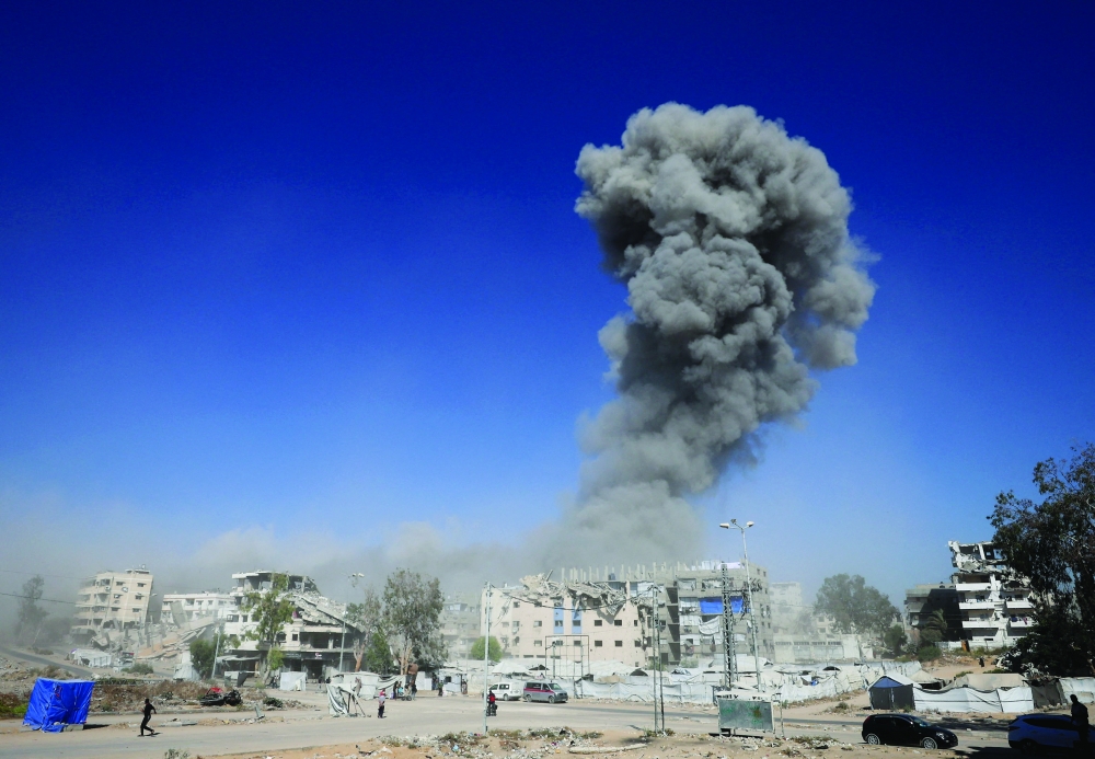 Smoke rises following an Israeli strike on a metal foundry in Gaza City, July 12, 2026. REUTERS/Dawoud Abu Alkas