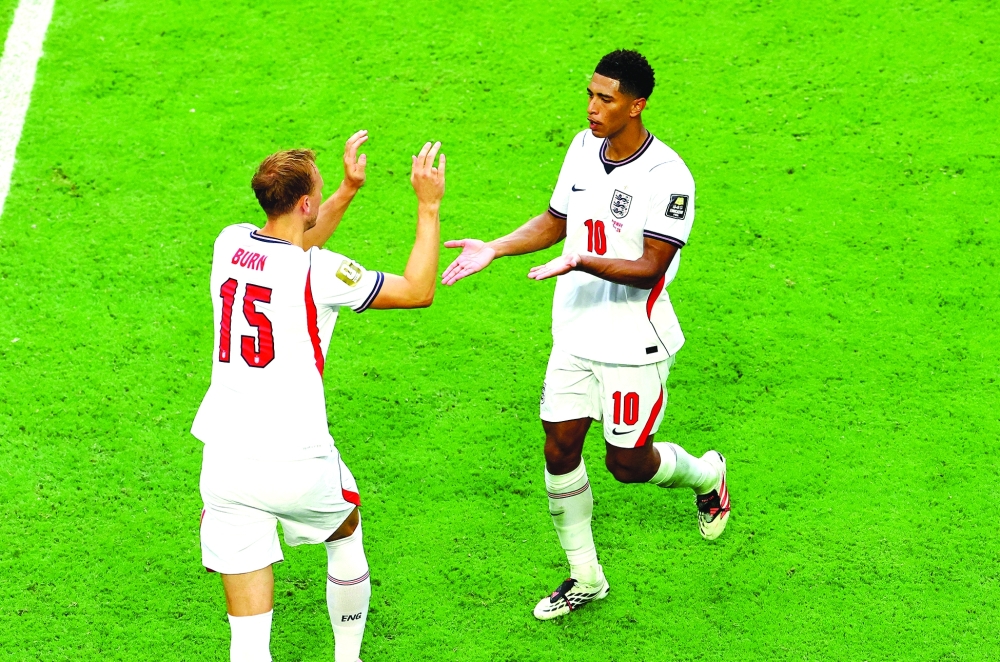 England's Dan Burn (L). — Reuters