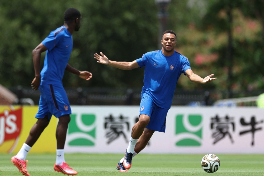 France's forward #10 Kylian Mbappe takes part in an MD-1 training session  
