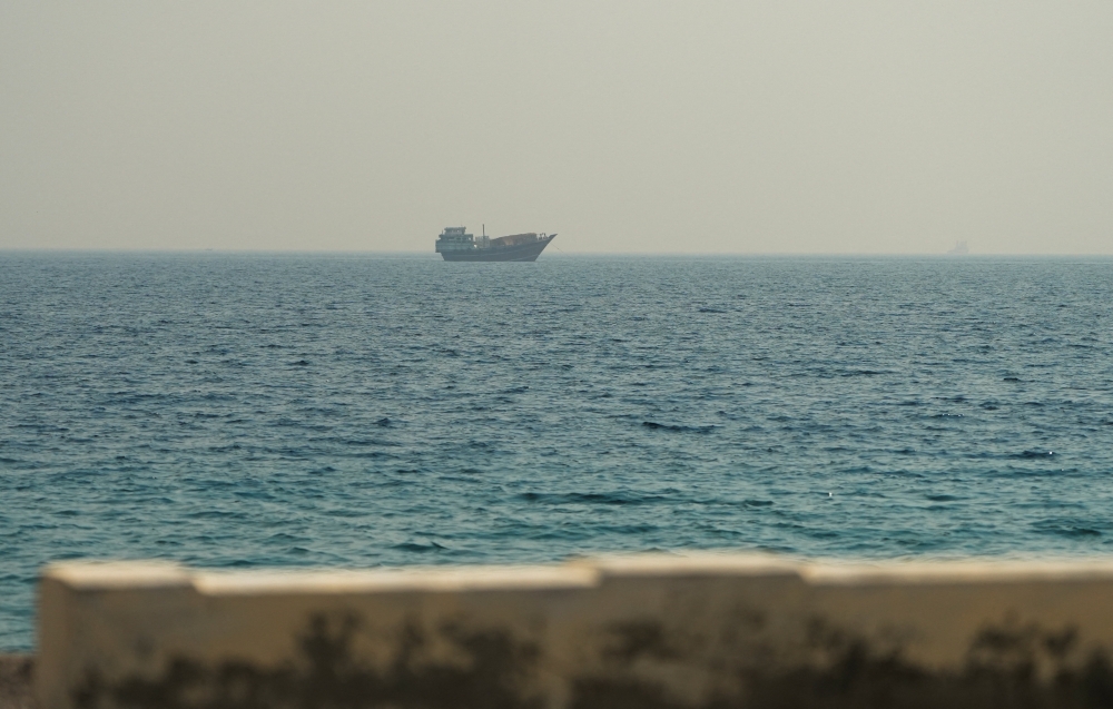 A vessel at the Strait of Hormuz, as seen from Musandam, Oman, July 9, 2026. REUTERS/Stringer