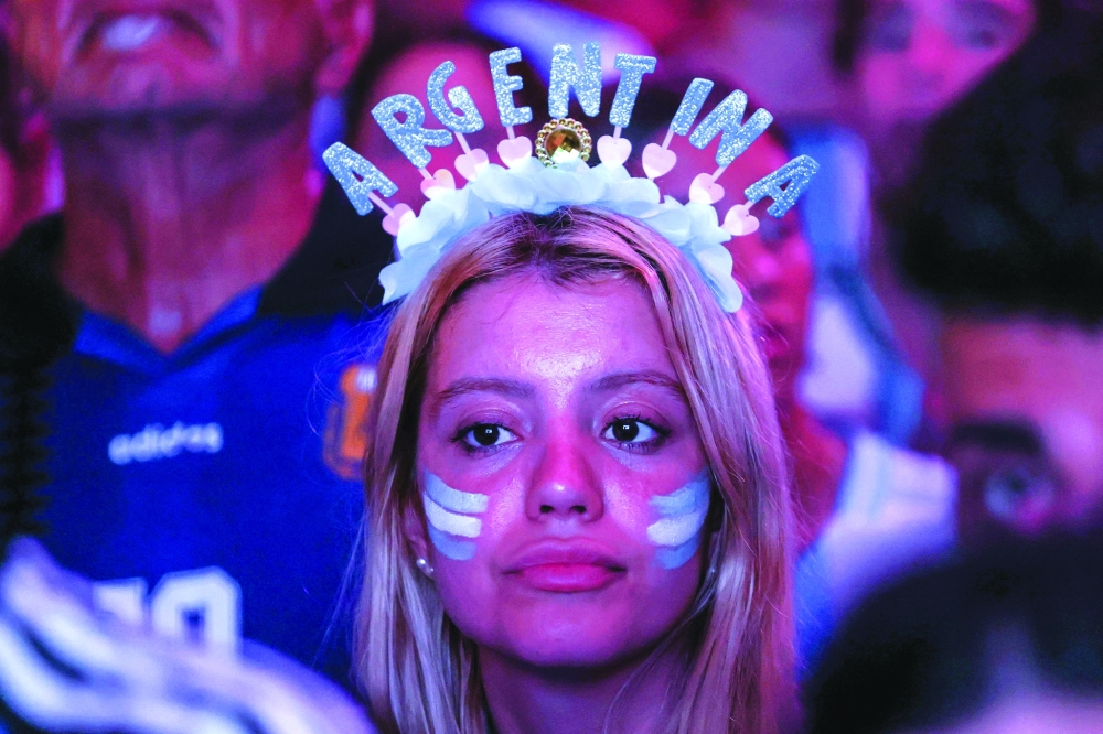 An Argentina fan watches the World Cup quarterfinal 