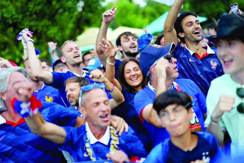  
France fans gather ahead of semi final match. — Reuters