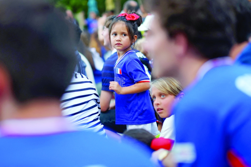 France fans gather ahead of semi final match. — Reuters