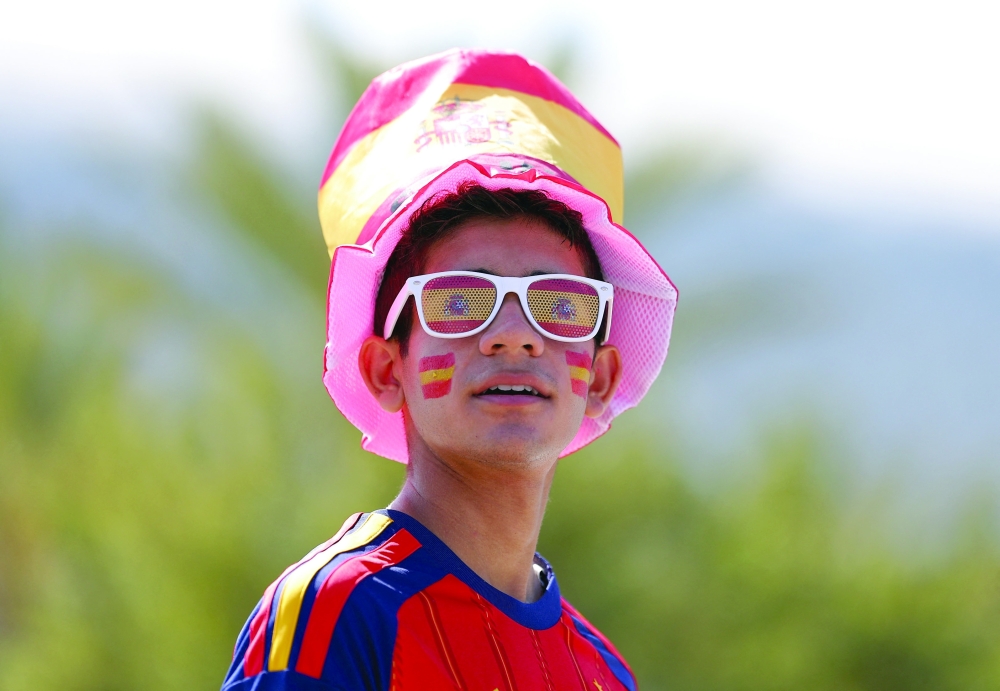  
Spain fans outside the stadium before the match. — Reuters