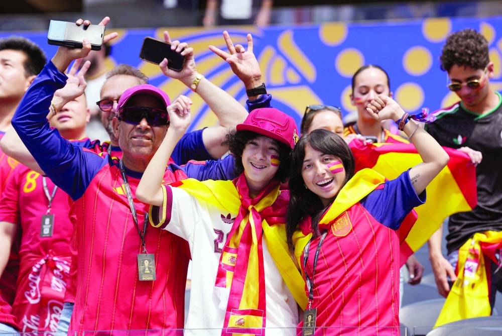 Spain fans inside the stadium before the match. — Reuters