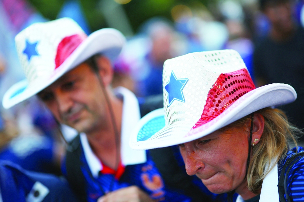 France fans gather ahead of their semi final match. — Reuters