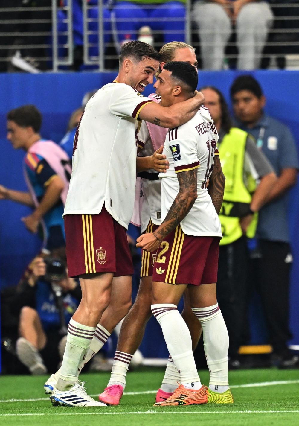  
Spain's Pedro Porro celebrates scoring their second goal with teammate Fabian Ruiz 