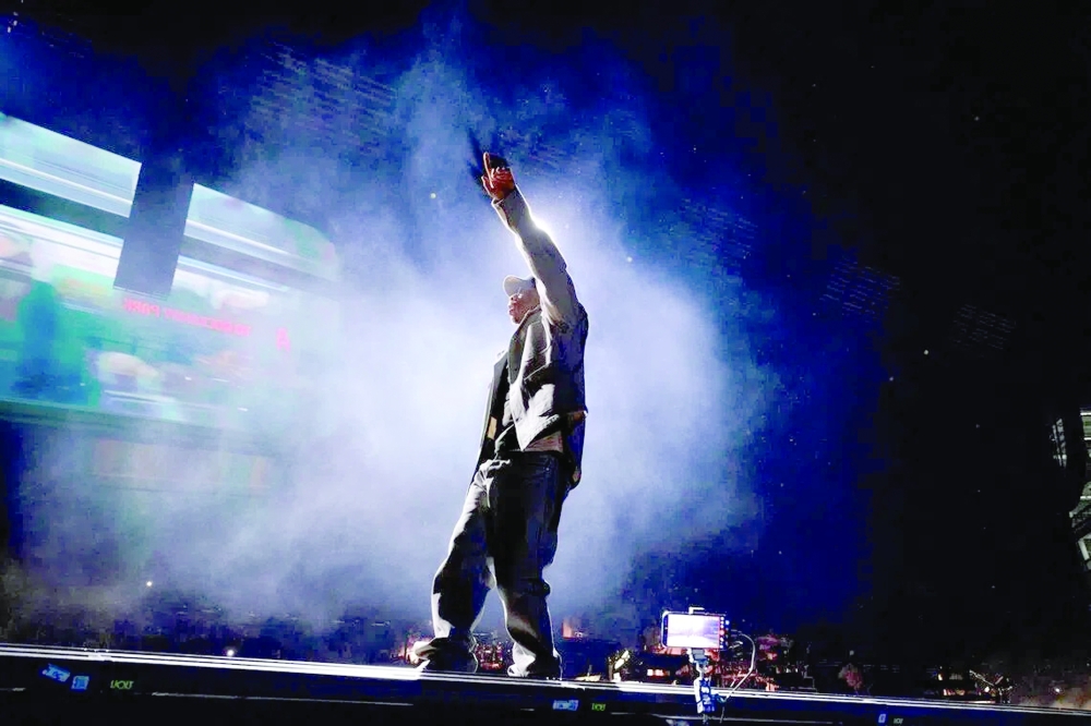Jay-Z taking the stage after midnight after a delay on the final night of a three-show series at Yankee Stadium in New York — NYT