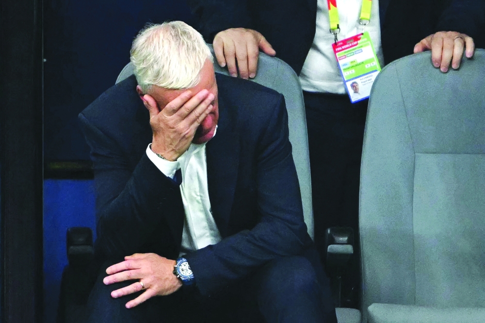  France's coach Deschamps reacts after losing. — AFP   