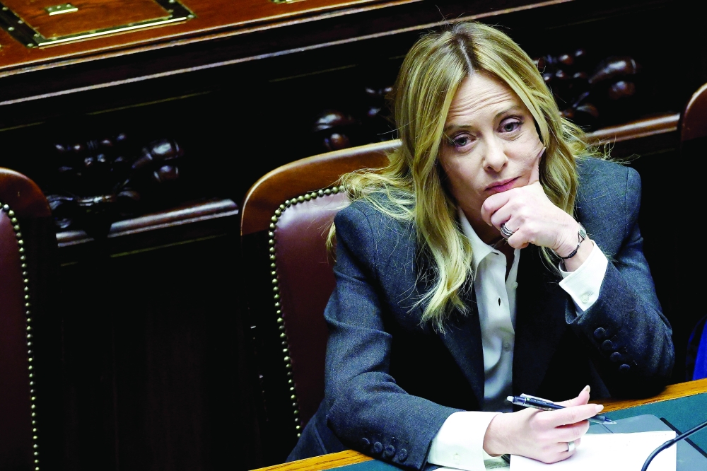 Italy's PM Giorgia Meloni listens to a debate at the lower house of Parliament in Rome. — AFP