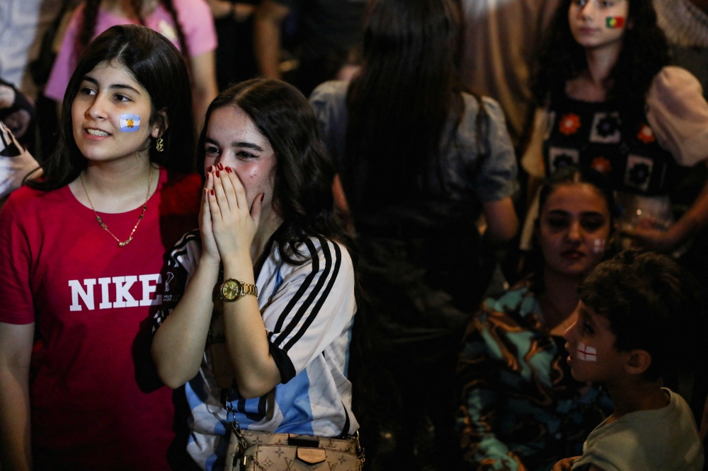 SOCCER-WORLDCUP-ENG-ARG/FANS-SYRIA