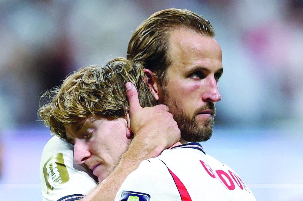  
England's Kane and Gordon after the match. — Reuters
