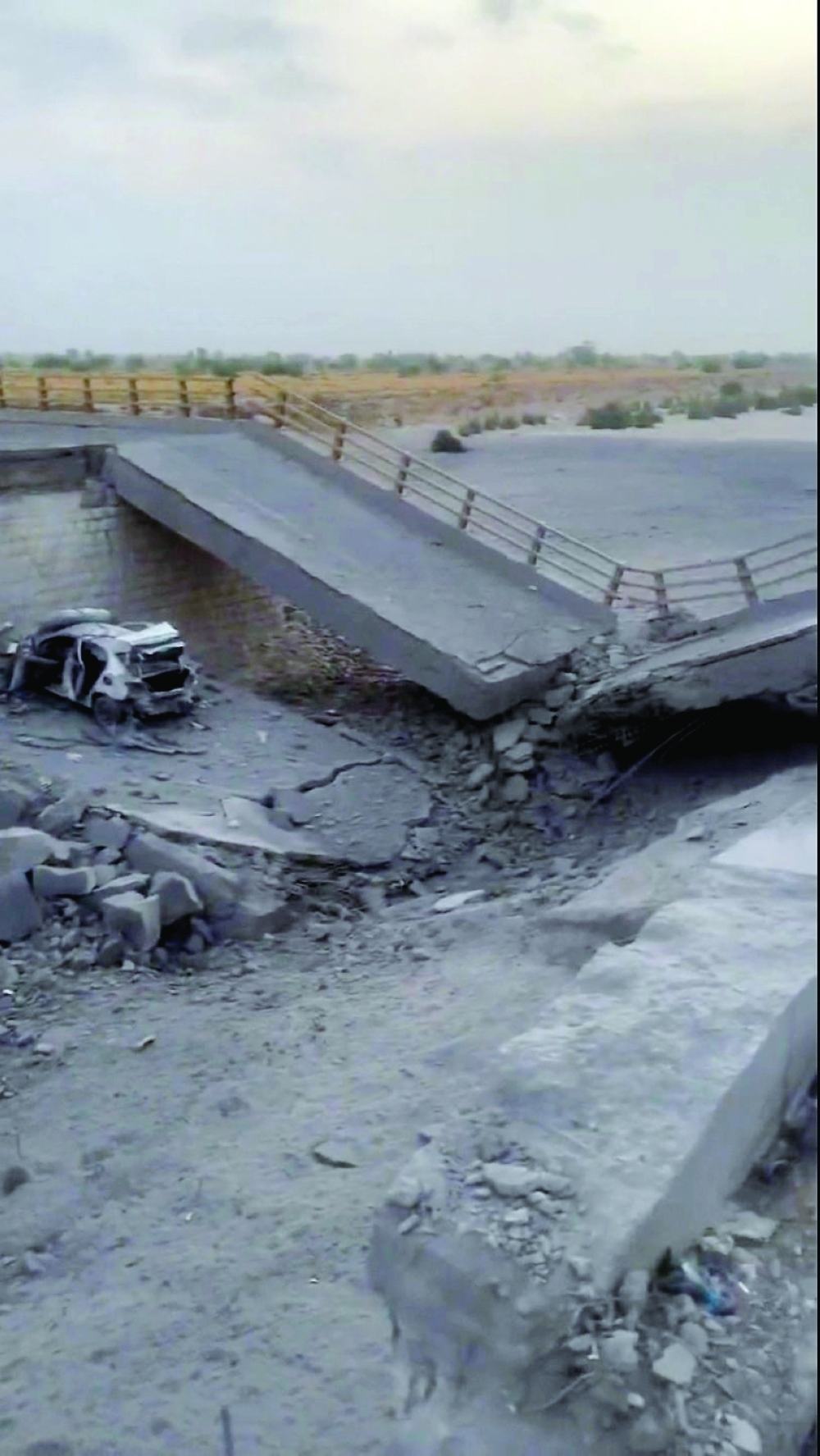 A damaged portion of a bridge in the aftermath of a US strike, in Bandar Khamir, Hormozgan province, Iran
