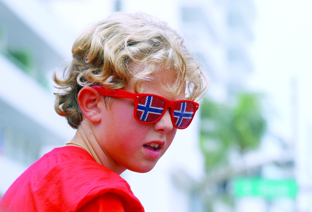 
A young Norway fan wears sunglasses featuring the national flag. — Reuters 