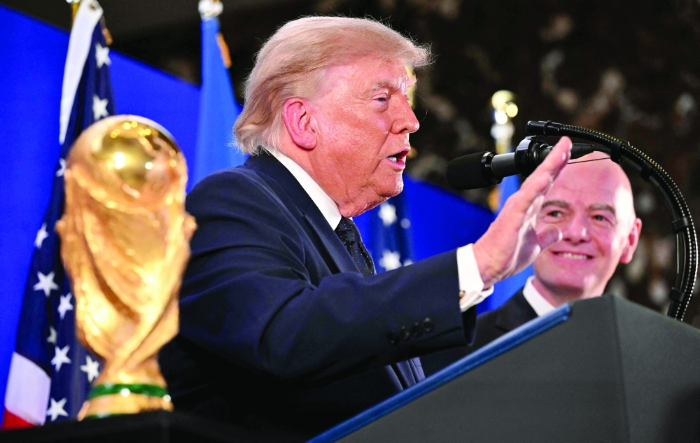 US President Donald Trump speaks during a Fifa reception at Trump Tower in New York. — AFP