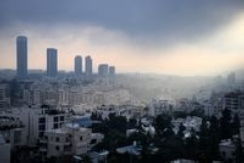 A view of numerous buildings in the city centre of Amman. Iran presses Jordan to end US military presence.