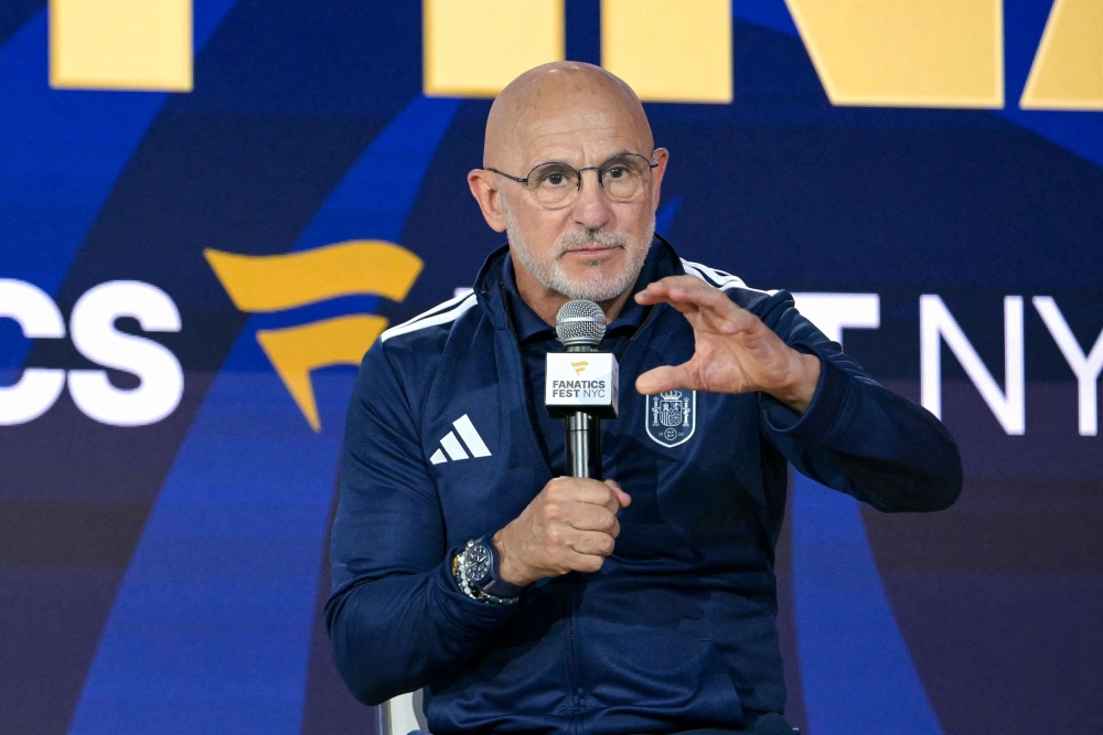 Spain's head coach Luis de la Fuente speaks to fans at the Javits Center in New York 