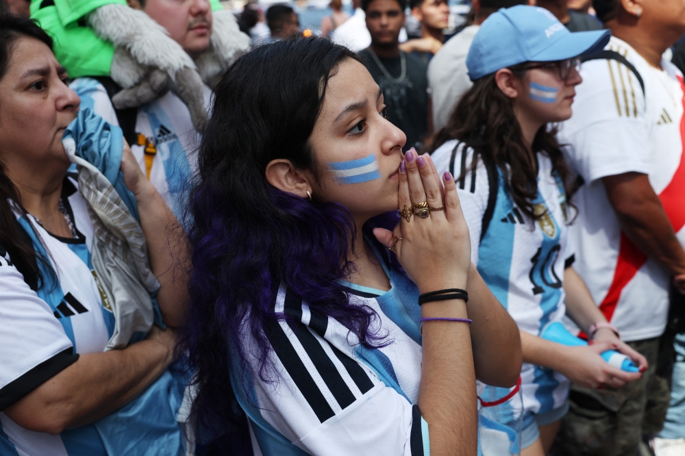 Argentina fans watch the FIFA World Cup final. — Reuters