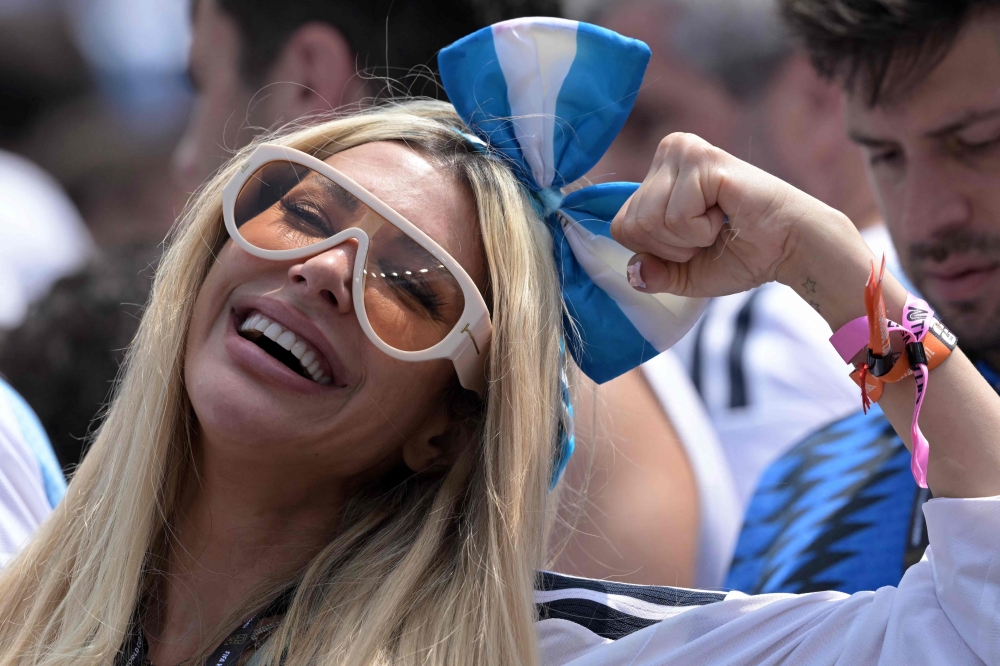 An Argentina fan cheers ahead of the final. — AFP