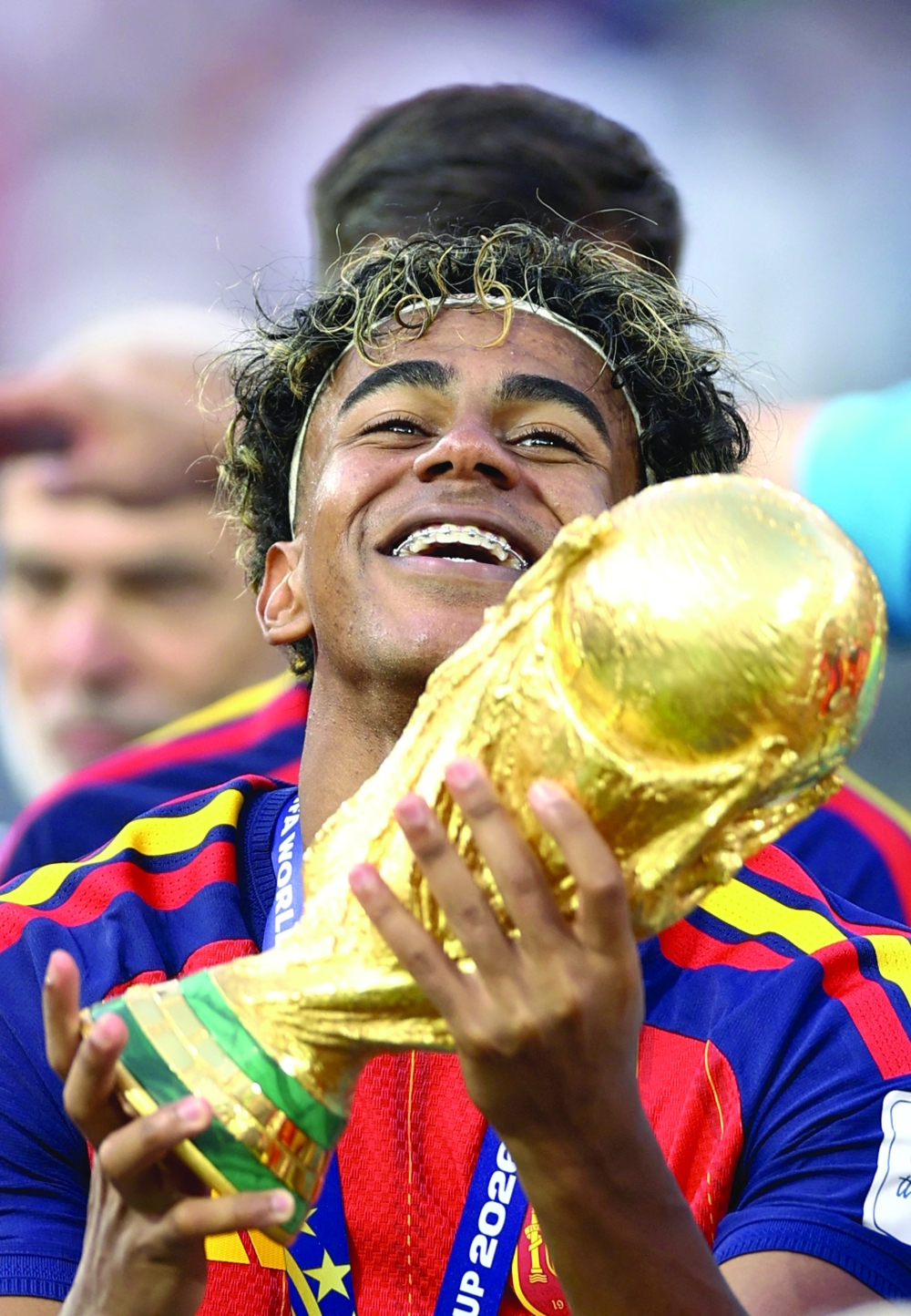  
Spain's Lamine Yamal lifts the World Cup trophy. — Reuters