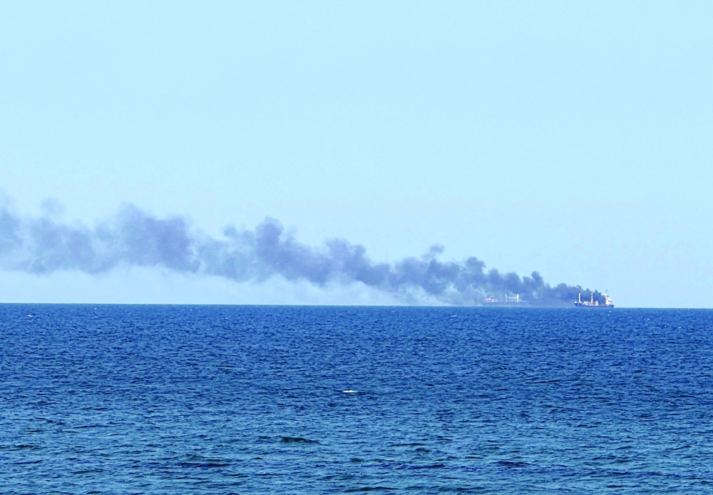 Smoke rises from a vessel on fire in Odesa, Ukraine. — Reuters 