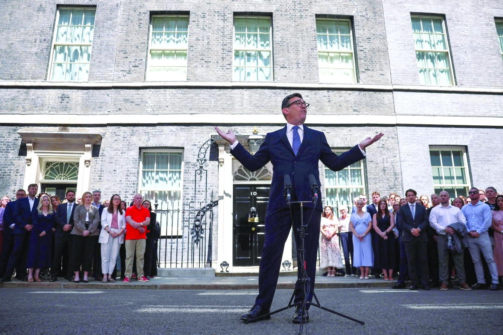 Britain's new PM Andy Burnham gives his first speech in front of 10 Downing Street. — AFP