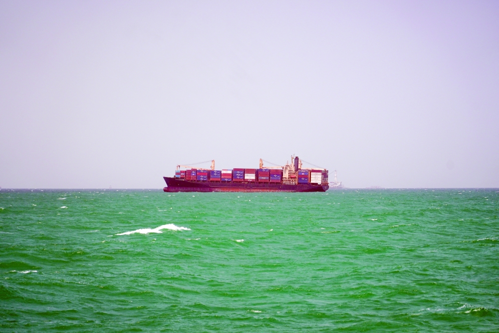 A cargo ship sails in Saudi waters near the Dammam Port in Dammam, Saudi Arabia. — Reuters
